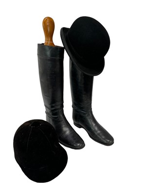 Lot 974 - Pair of ladies vintage black leather hunting boots with wooden trees, Lock & Co. bowler hat and a Moss Bros. black velvet riding hat