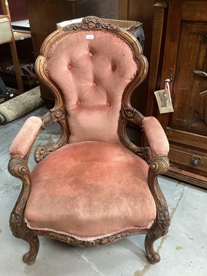 Lot 1369 - Victorian heavily carved mahogany open arm chair with velvet upholstery