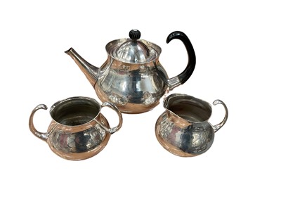 Lot 401 - Eric Clements for Mappin & Webb, silver plated three piece teaset