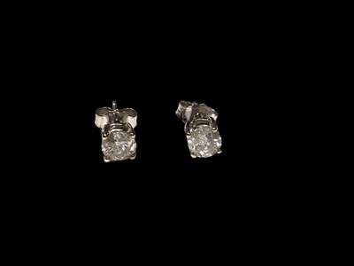 Lot 53 - Pair of diamond single stone stud earrings