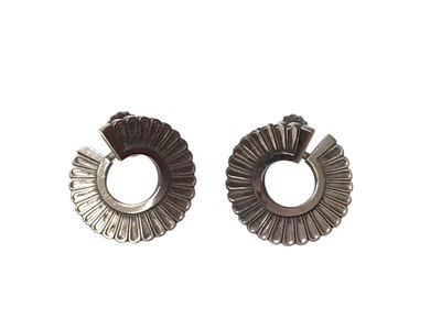 Lot 56 - Pair of Georg Jensen Danish silver screw back earring of spiral form, model 92