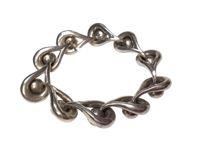 Lot 61 - Gucci silver bracelet, the heavy solid silver links with ball and loop design, signed Gucci.