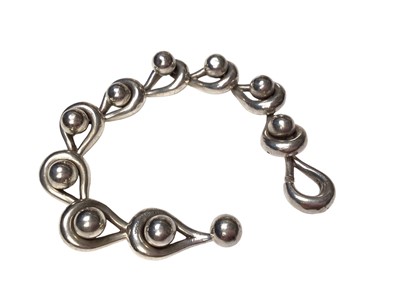 Lot 61 - Gucci silver bracelet, the heavy solid silver links with ball and loop design, signed Gucci.