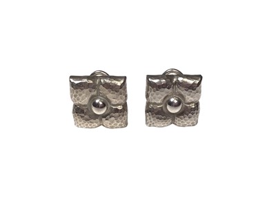 Lot 62 - Pair Tiffany & Co. silver Hammered Fiore flower earrings designed by Paloma Picasso