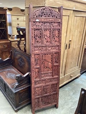 Lot 1362 - 20th century Burmese hardwood screen with pierced decoration.