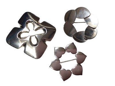 Lot 66 - Three 1960s modernist silver brooches