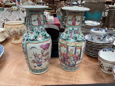 Lot 410 - Pair of 19th century Chinese famille rose baluster vases painted with battle scenes