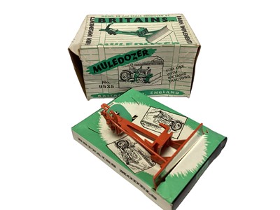 Lot 246 - Britains diecast farm implements including Muldozer No.9535 & Three Furrow Plough No.9530, boxed (2)