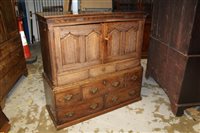 Lot 1538 - George III oak livery cupboard in two parts -...