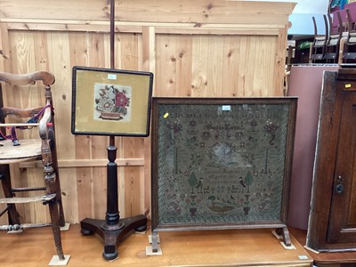 Lot 1316 - Victorian sampler dated 1882 ' Sarah Hopkins Aged 12' in glazed fire screen frame and Victorian rosewood pole screen with floral embroidered panel (2)