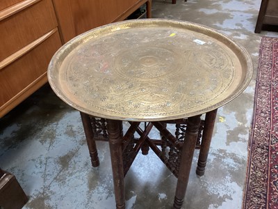 Lot 1318 - Old Indian Benares brass circular tray on folding stand