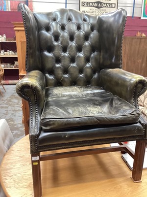 Lot 1320 - Georgian-style buttoned green leather wing chair on chamfered legs