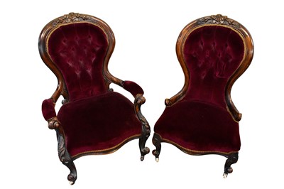 Lot 1425 - Pair of mid Victorian his and hers upholstered easy chairs