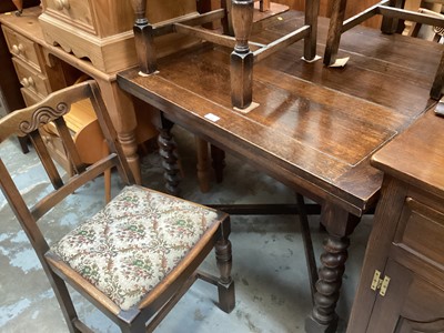 Lot 1328 - 1920s oak extending dining table on spiral twist supports and four oak dining chairs (5)