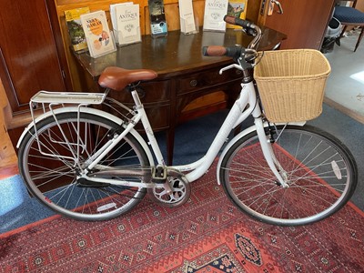 Lot 11 - Ladies Raleigh Caprice bicycle with wicker basket and brown leather saddle
