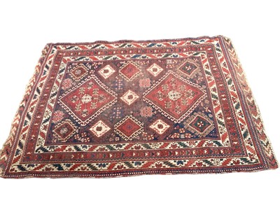 Lot 1369 - Two Eastern rugs with geometric decoration on red and blue ground, 175cm x 128cm