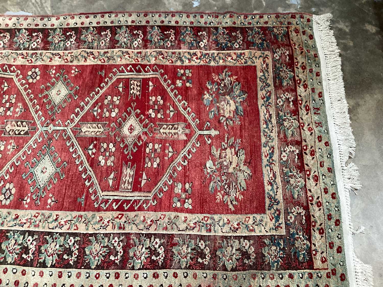 Lot 1370 - Eastern rug with three central medallions