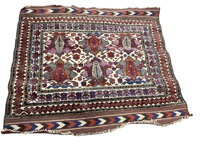 Lot 1374 - Eastern rug with geometric decoration on red, blue and cream ground, 120cm x 112cm