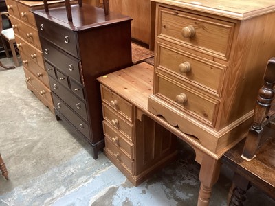 Lot 1329 - Modern pine bedside chest of three drawers 46cm and modern pine kneehole dressing table with four drawers 104cm (2)