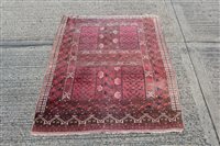 Lot 1548 - Tekke rug, the brick-red field with angular...