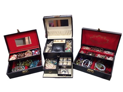 Lot 1033 - Three jewellery boxes containing costume jewellery including various bead necklaces, pendants, rings etc