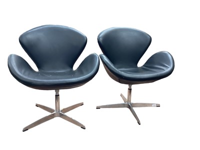 Lot 1443 - Pair of stylish swivel chairs