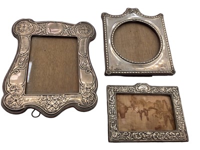 Lot 1039 - Three antique silver photograph frames