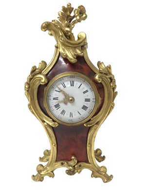 Lot 704 - Late 19th century French rococo red tortoiseshell ormolu  mantel clock