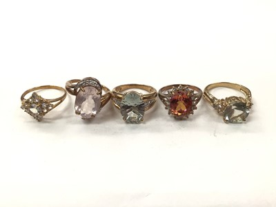 Lot 1044 - Five 9ct gold multi-gem set cocktail rings