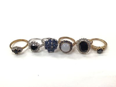 Lot 1045 - Six 9ct gold blue stone and gem set dress rings