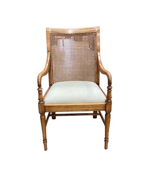 Lot 1400 - Beech elbow chair with cane back and drop in padded seat