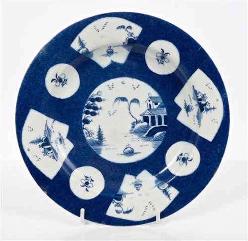 Lot 13 - 18th century Bow blue and white plate with fan-...