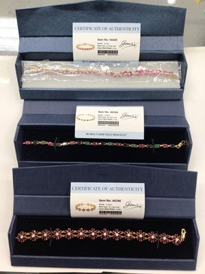 Lot 1053 - Three 9ct gold gem set bracelets, boxed with certificates