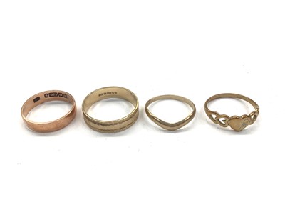 Lot 1056 - Antique 9ct rose gold wedding ring and three other 9ct rings (4)