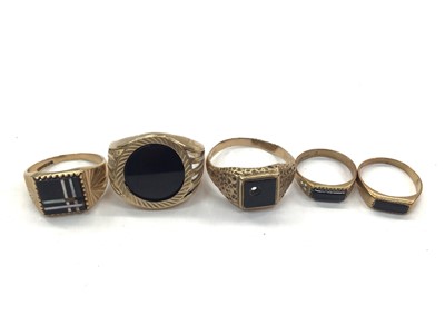 Lot 1063 - Five 9ct gold black onyx signet rings