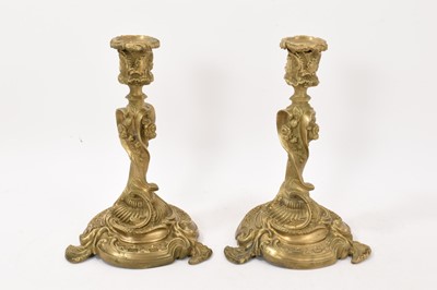 Lot 1137 - Pair of gilt metal candlesticks in Rococo style