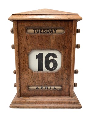 Lot 337 - Early 20th century wooden perpetual desk calendar