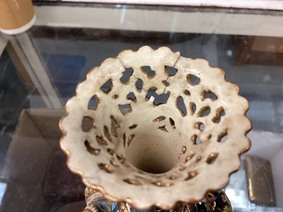 Lot 420 - Group of reticulated vases, possibly Zsolnay Pecs, together with a transfer printed two handled vase.