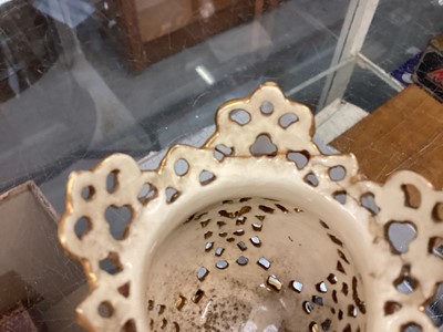 Lot 420 - Group of reticulated vases, possibly Zsolnay Pecs, together with a transfer printed two handled vase.
