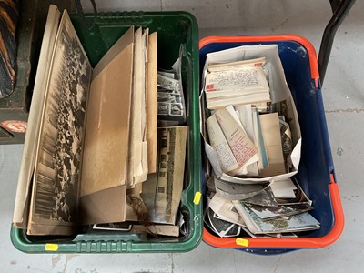 Lot 426 - Two boxes of mixed ephemera to include postcards and photographs.