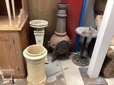 Lot 1418 - Cast iron garden chimney, iron bird bath, another bird bath and a chimney pot (4)