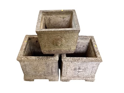 Lot 1425 - Pair of square concrete garden planters, 38cm high, together with another, 30cm high (3)