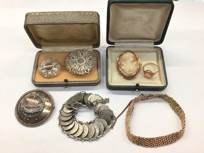 Lot 1073 - Early 20th century continental gold bracelet, hallmarked 583, possibly Russian, a carved shell cameo brooch in 9ct gold mount and a rose gold ring, together with three silver brooches (6)