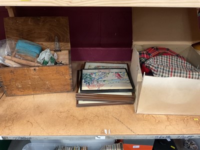 Lot 699 - Sundry items, incliding a box of hats, a box of fishing reels and crabbing lines, and a group of embroideries (1 shelf)