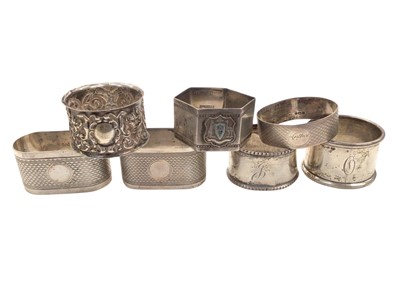 Lot 1081 - Seven various silver napkin rings