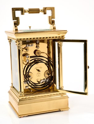 Lot 721 - 20th Century French carriage clock by L’Epee, the white enamelled dial with Roman and Arabic numerals and calendar day and date and alarm dial to the eight day two train movement striking and repea...