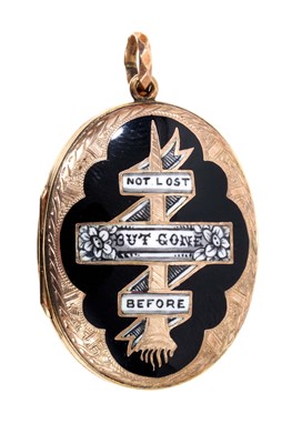 Lot 522 - Victorian mourning locket with black and white enamel front 'Not Lost But Gone Before' with engraved gold back and front, 45mm.