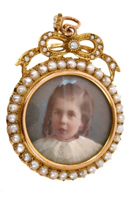 Lot 524 - Edwardian 15ct gold double-sided locket, opening to reveal two further portrait miniatures, the circular seed pearl frame with ribbon surmount, 45 x 30mm.