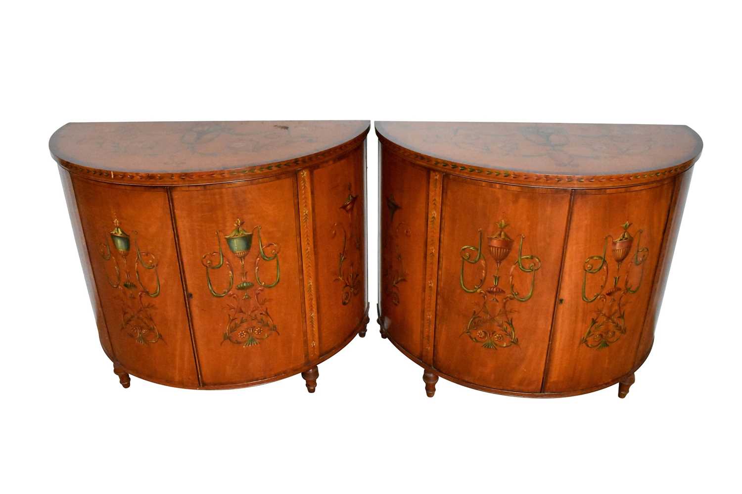 Lot 1508 - Pair of George III style satinwood and polychrome painted bowfront commodes