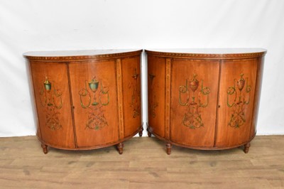 Lot 1508 - Pair of George III style satinwood and polychrome painted bowfront commodes